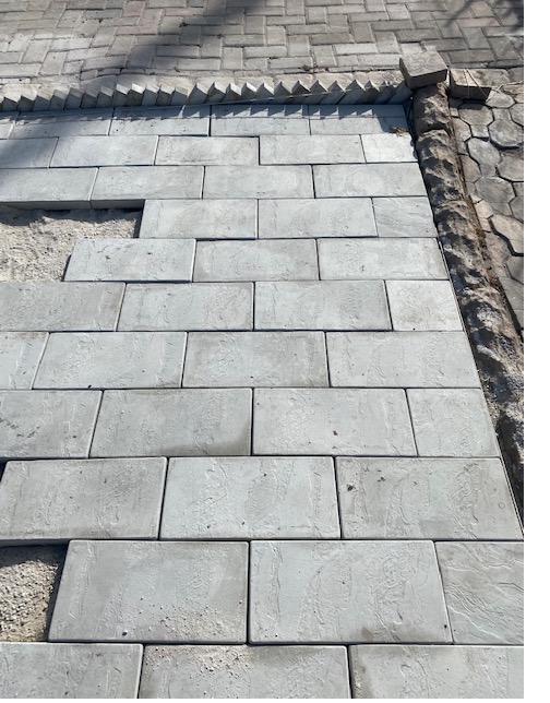 Long thin Herringbone blocks laid in a brick pattern
