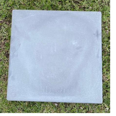 A 500 by 500 mm smooth square paver